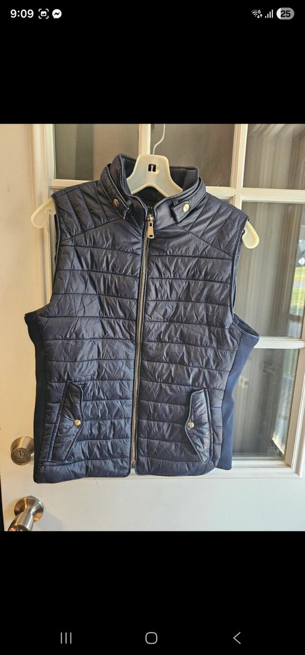 Zip up vest size Large